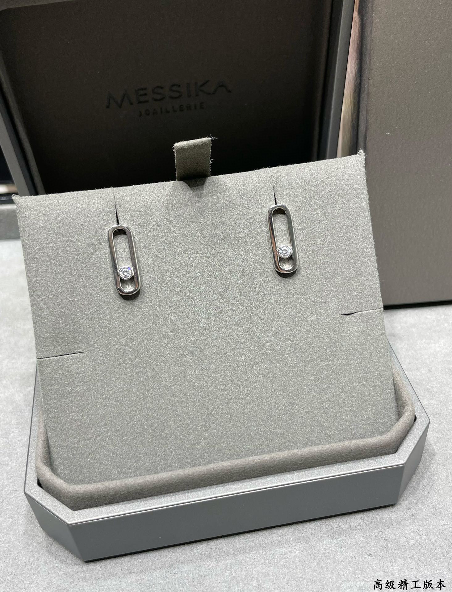 Mes1kaa stud earrings