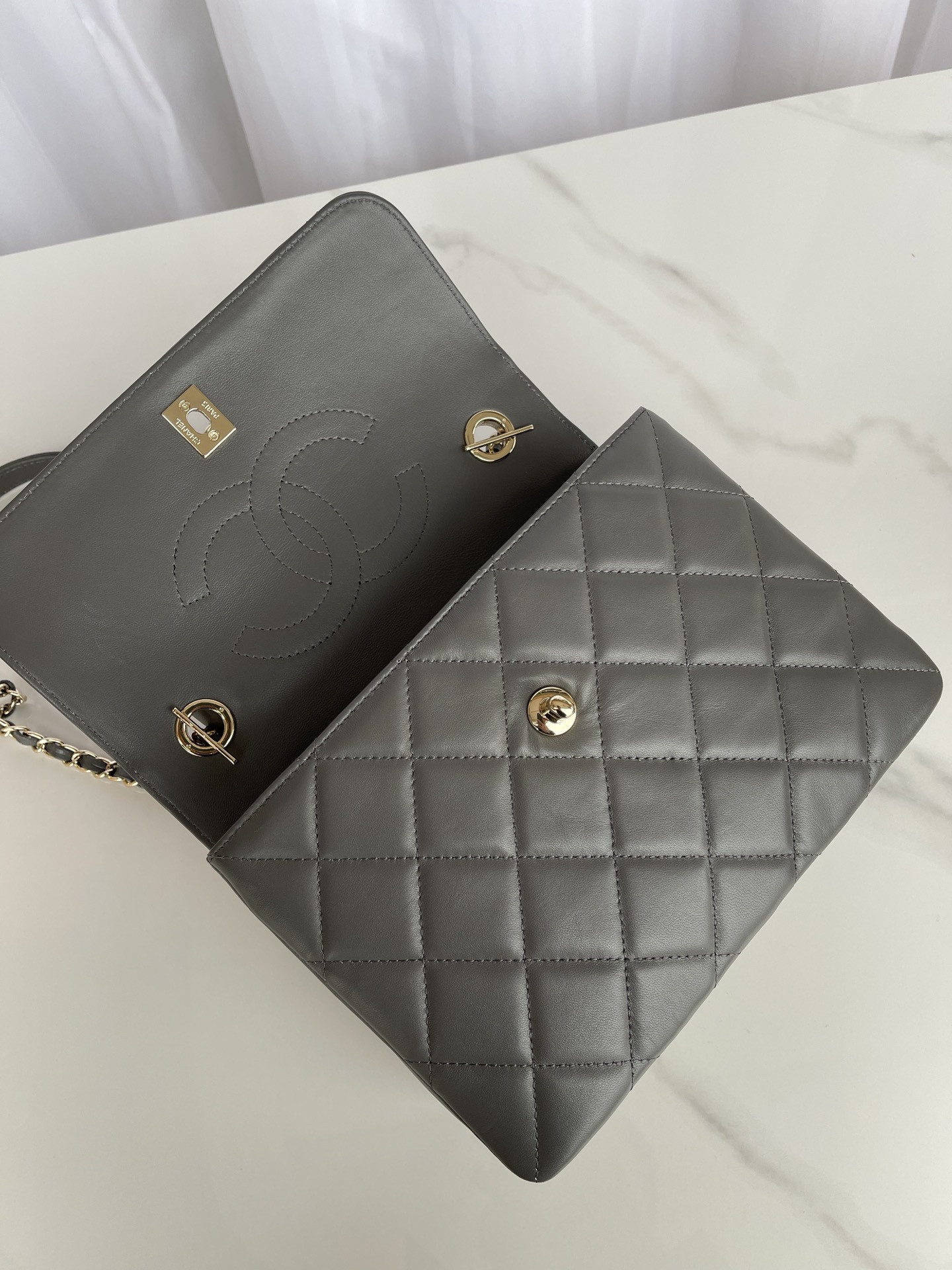 Ch*el flap bag with top handle 6.6 × 9.8 × 4.7 in