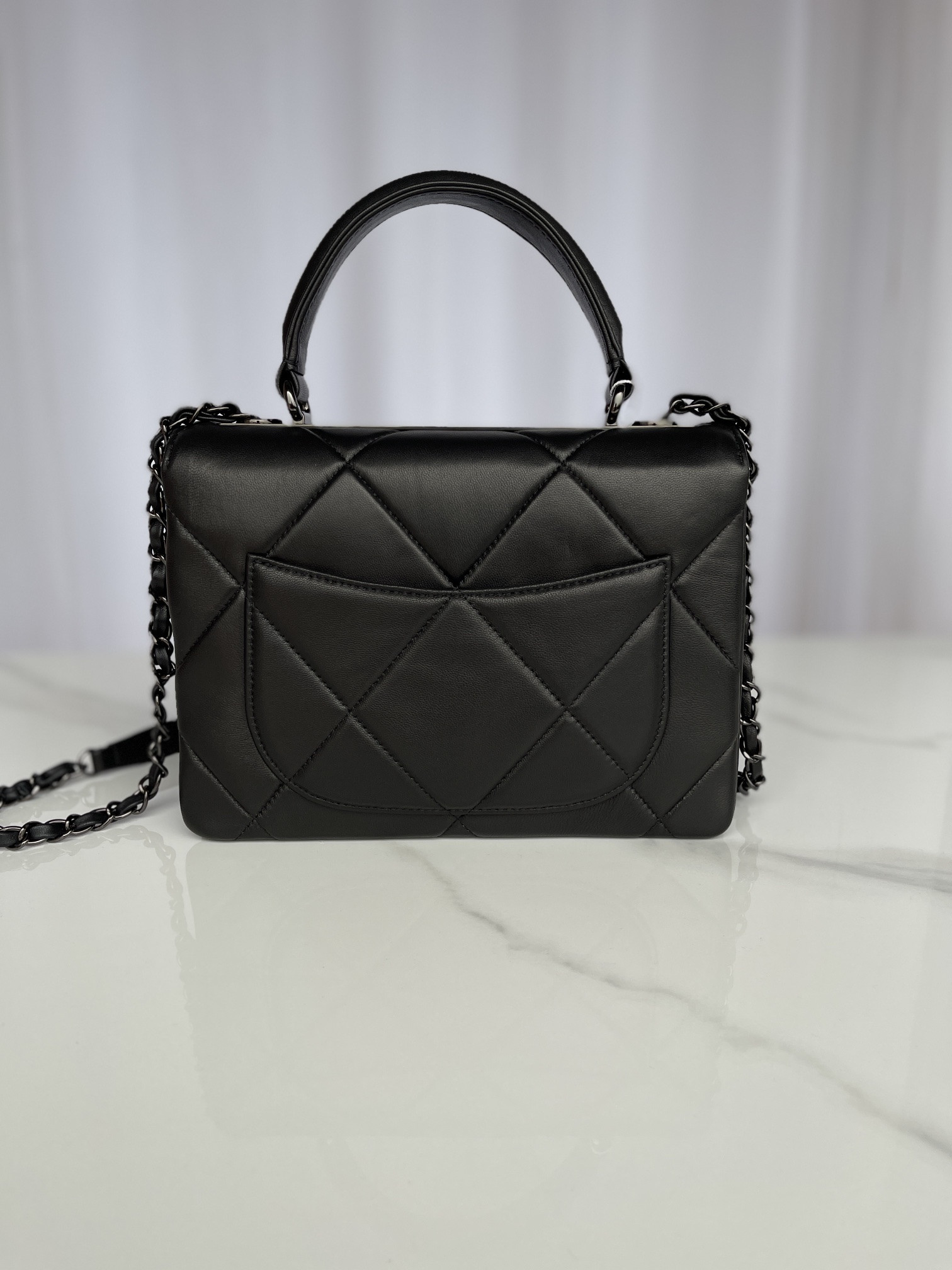Ch*el flap bag with top handle 6.6 × 9.8 × 4.7 in