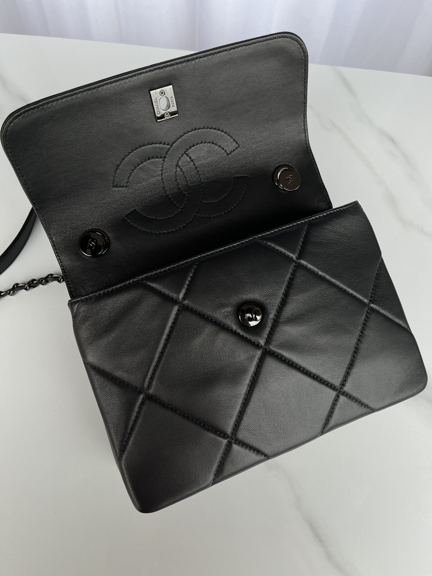 Ch*el flap bag with top handle 6.6 × 9.8 × 4.7 in