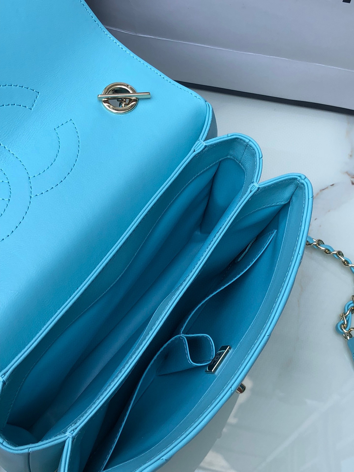 Ch*el flap bag with top handle 6.6 × 9.8 × 4.7 in