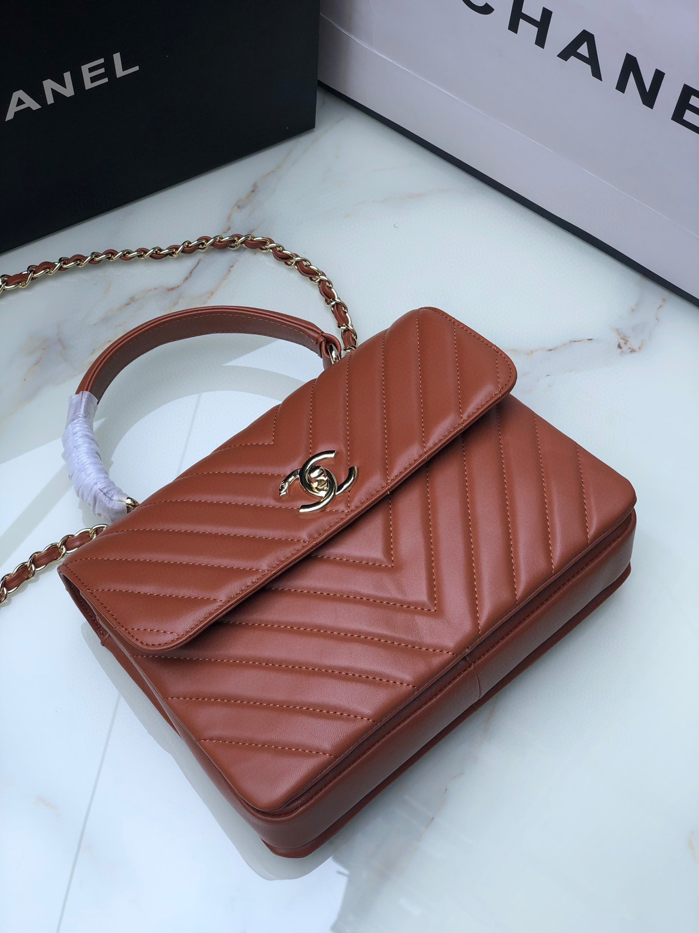Ch*el flap bag with top handle orange 6.6 × 9.8 × 4.7 in