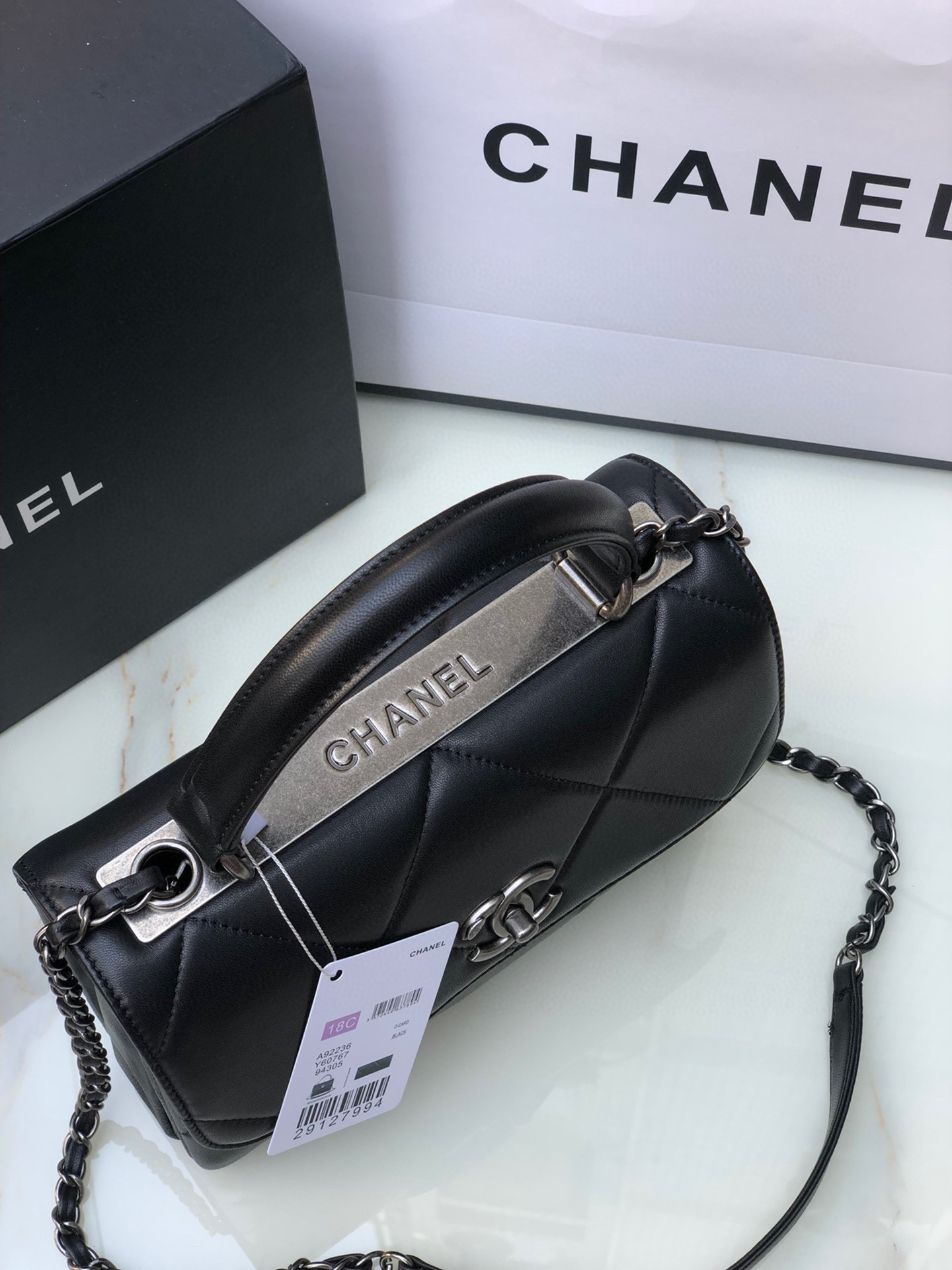Ch*el flap bag with top handle 6.6 × 9.8 × 4.7 in