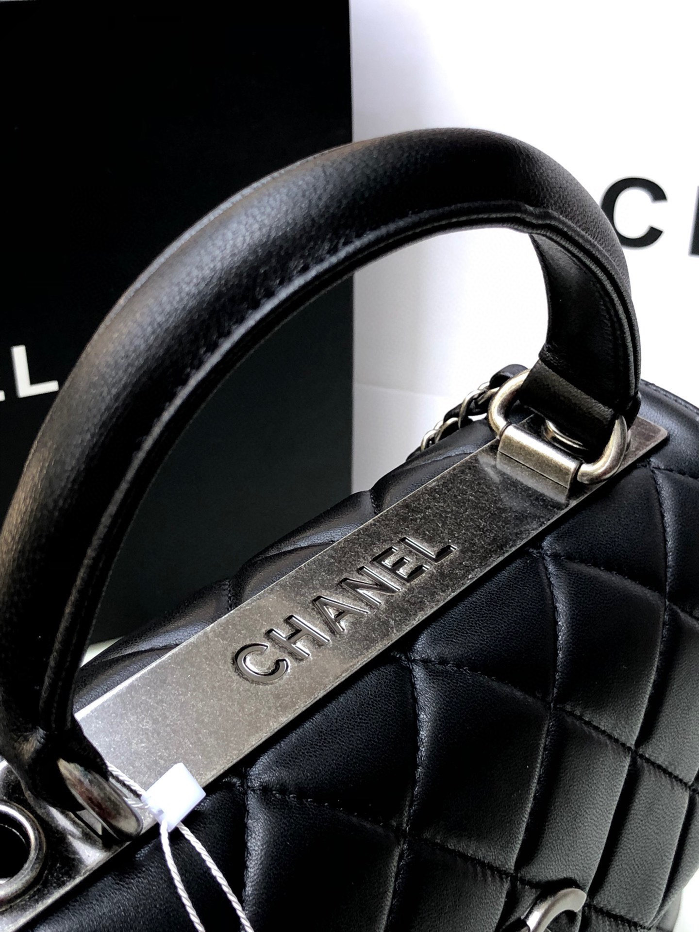 Ch*el flap bag with top handle 6.6 × 9.8 × 4.7 in