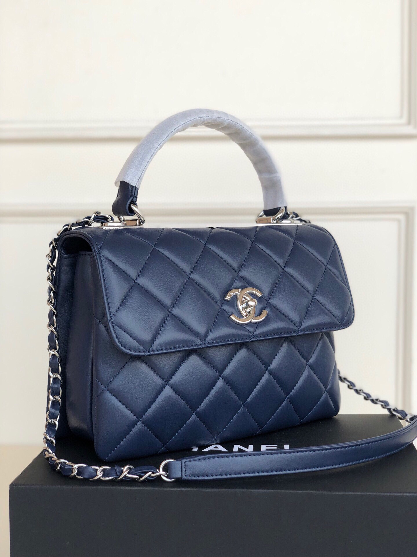 Ch*el flap bag with top handle 6.6 × 9.8 × 4.7 in