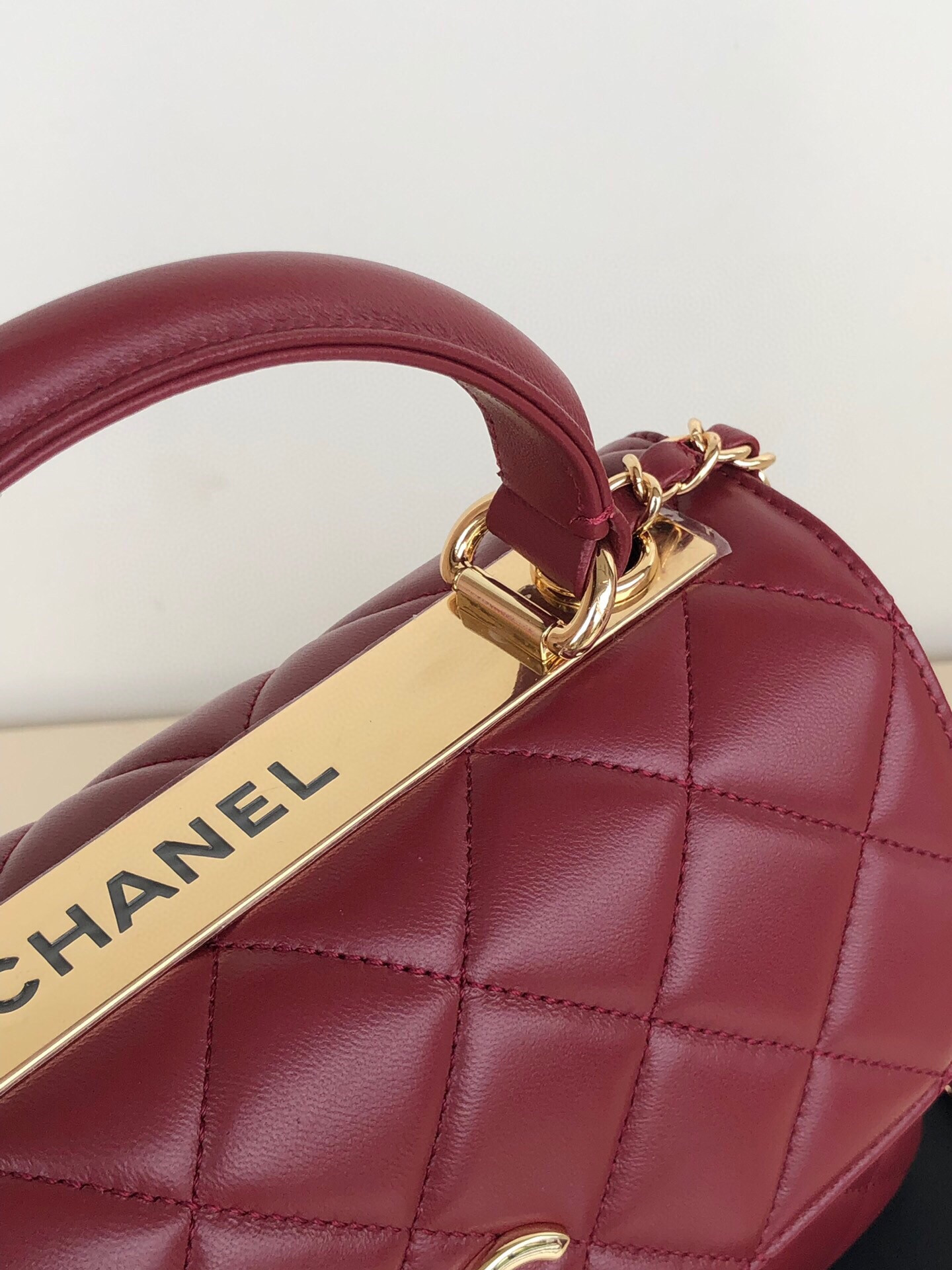 Ch*el flap bag with top handle 6.6 × 9.8 × 4.7 in