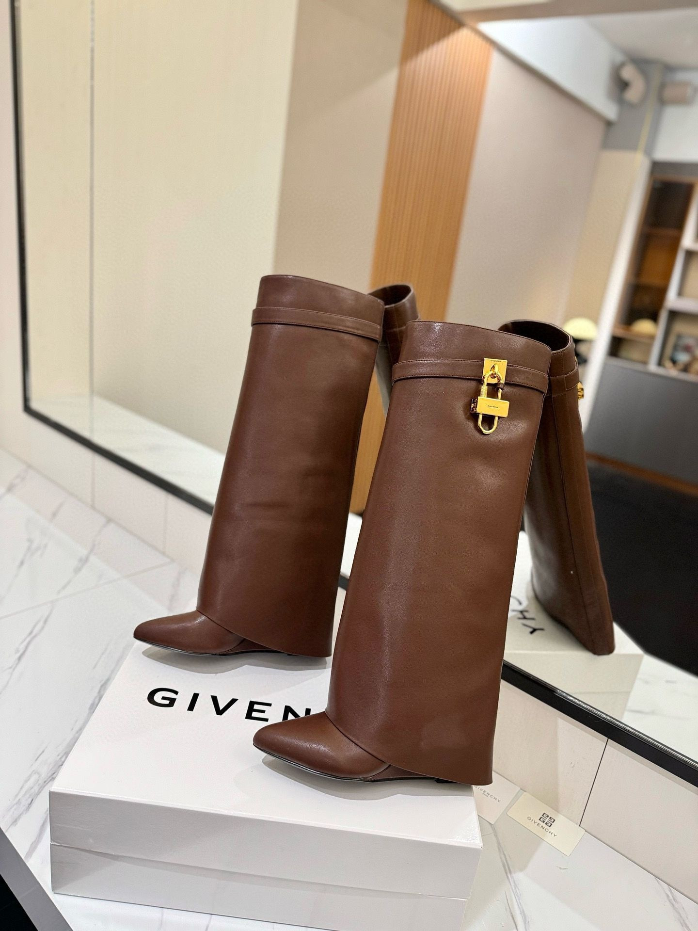 ua G1uenchy shark lock boots in leather