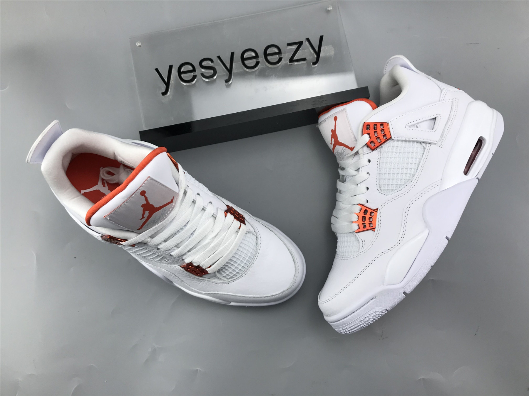 UA AIR JORDAN 4 RETRO METALLIC ORANGE