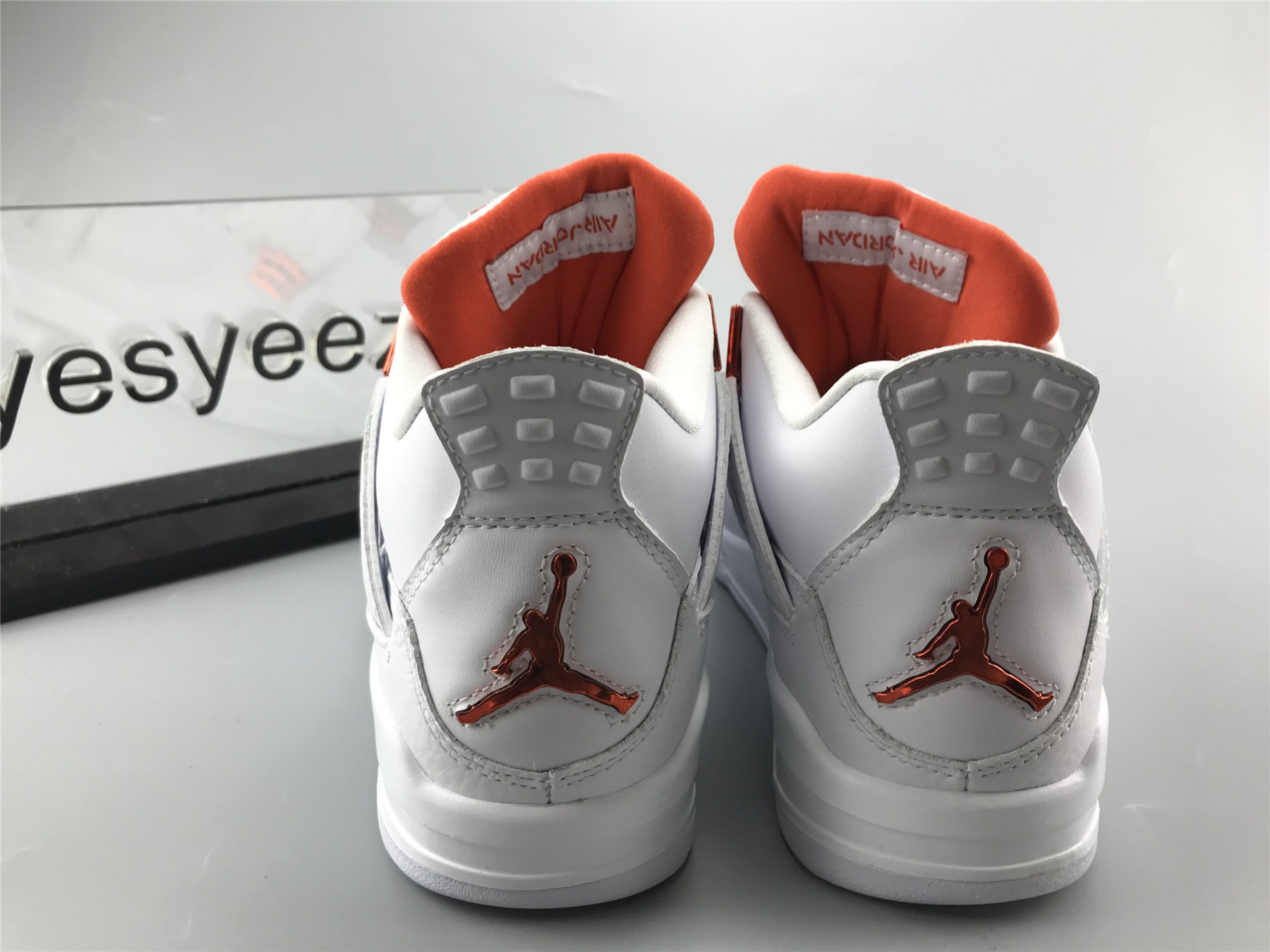 UA AIR JORDAN 4 RETRO METALLIC ORANGE