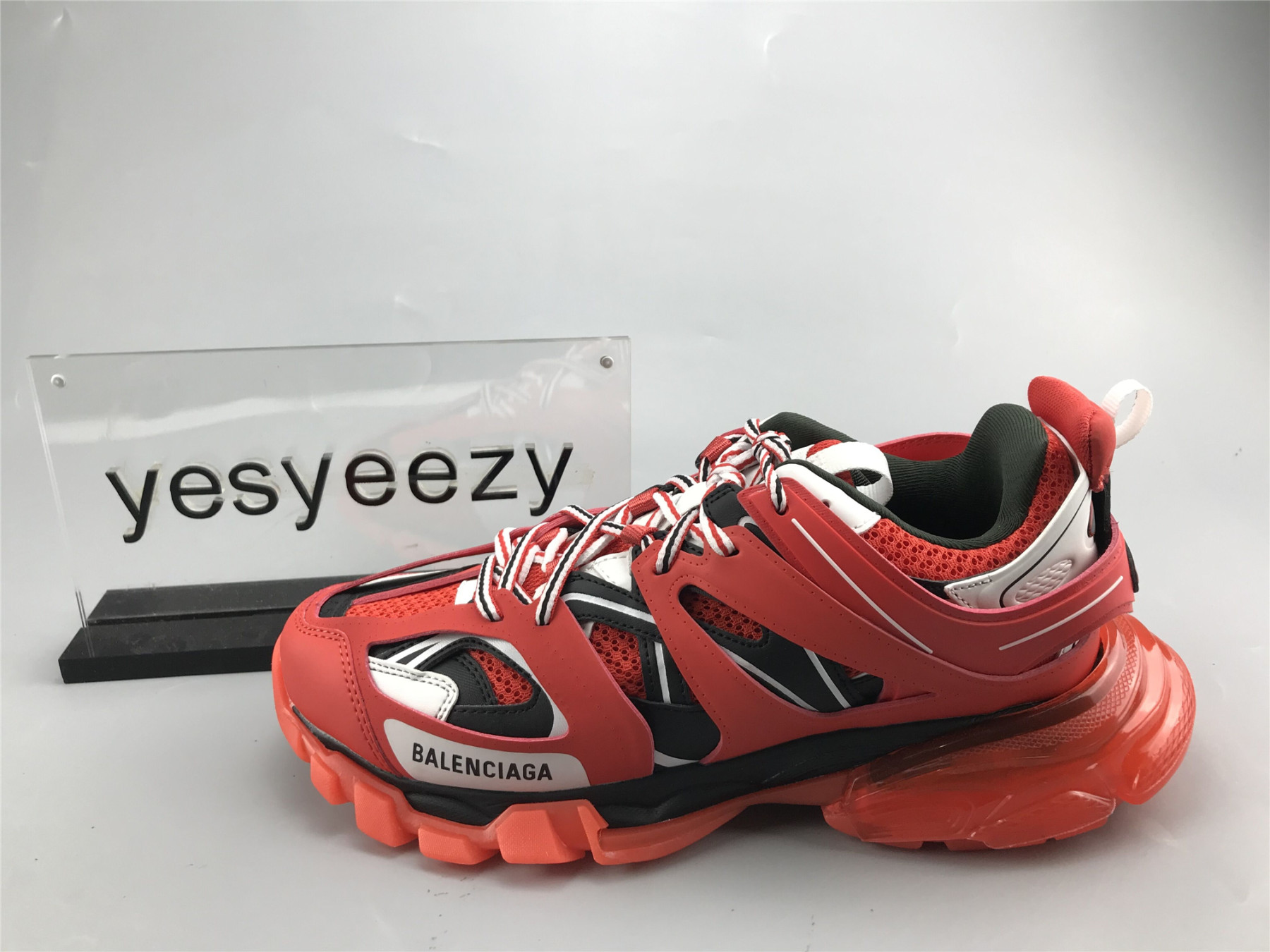 UA TRACK TRAINER RED TRANSPARENT SNEAKER