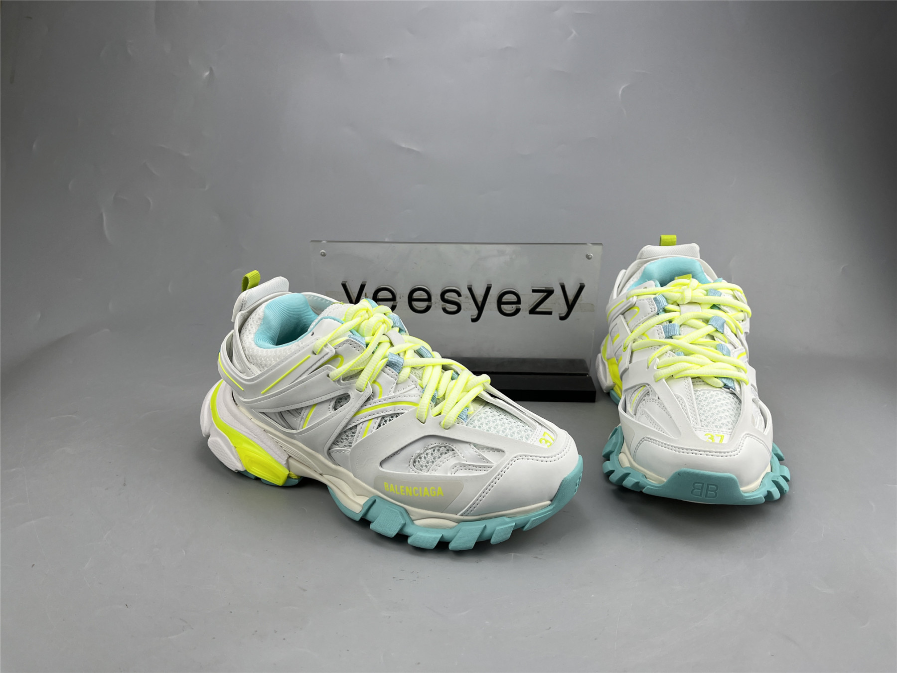 UA TRACK SNEAKER WHT FLUO Y TURQ