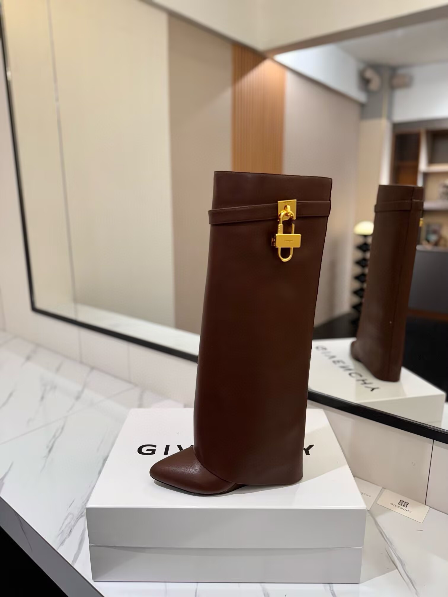 ua G1uenchy shark lock boots in leather