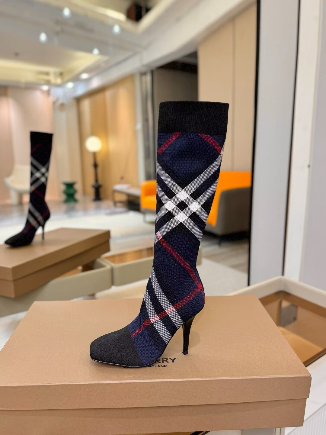 ua Bv*b*rry check high boots