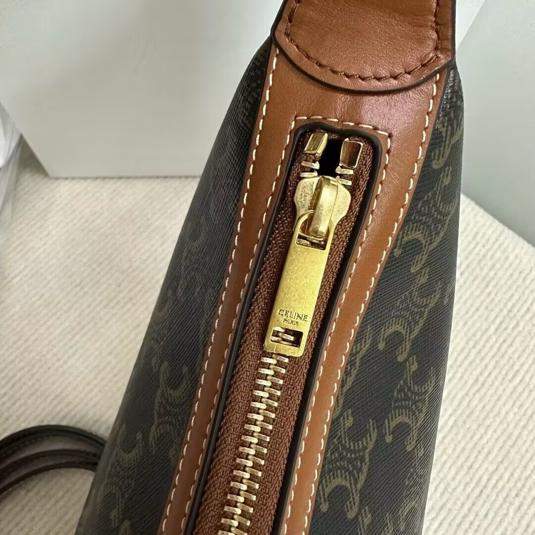 Ce1i*e SMALL HELOÏSE BAG IN TRIOMPHE CANVAS AND CALFSKIN 19x22x5cm