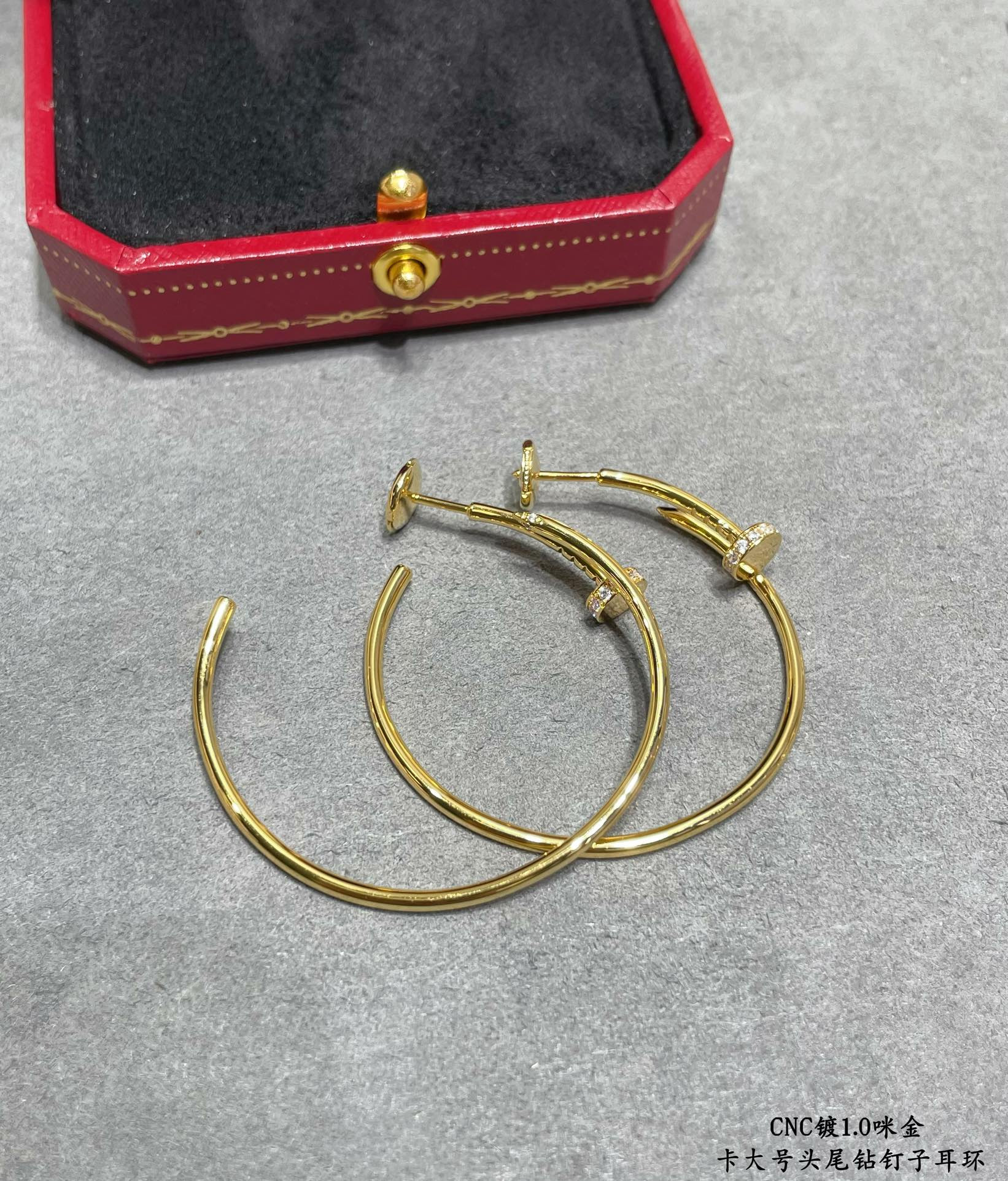 Ca*t1er Large size head and tail D1am0nd nail Earrings