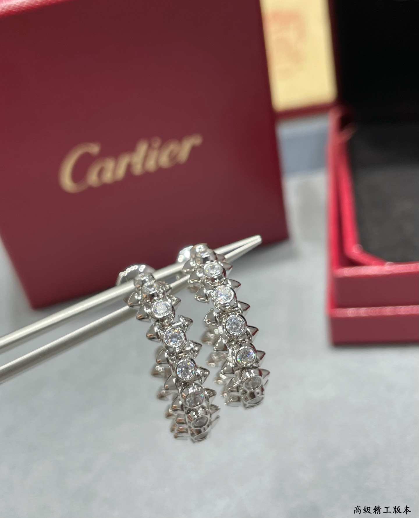 Ca*t1er D1am0nd bullet earrings