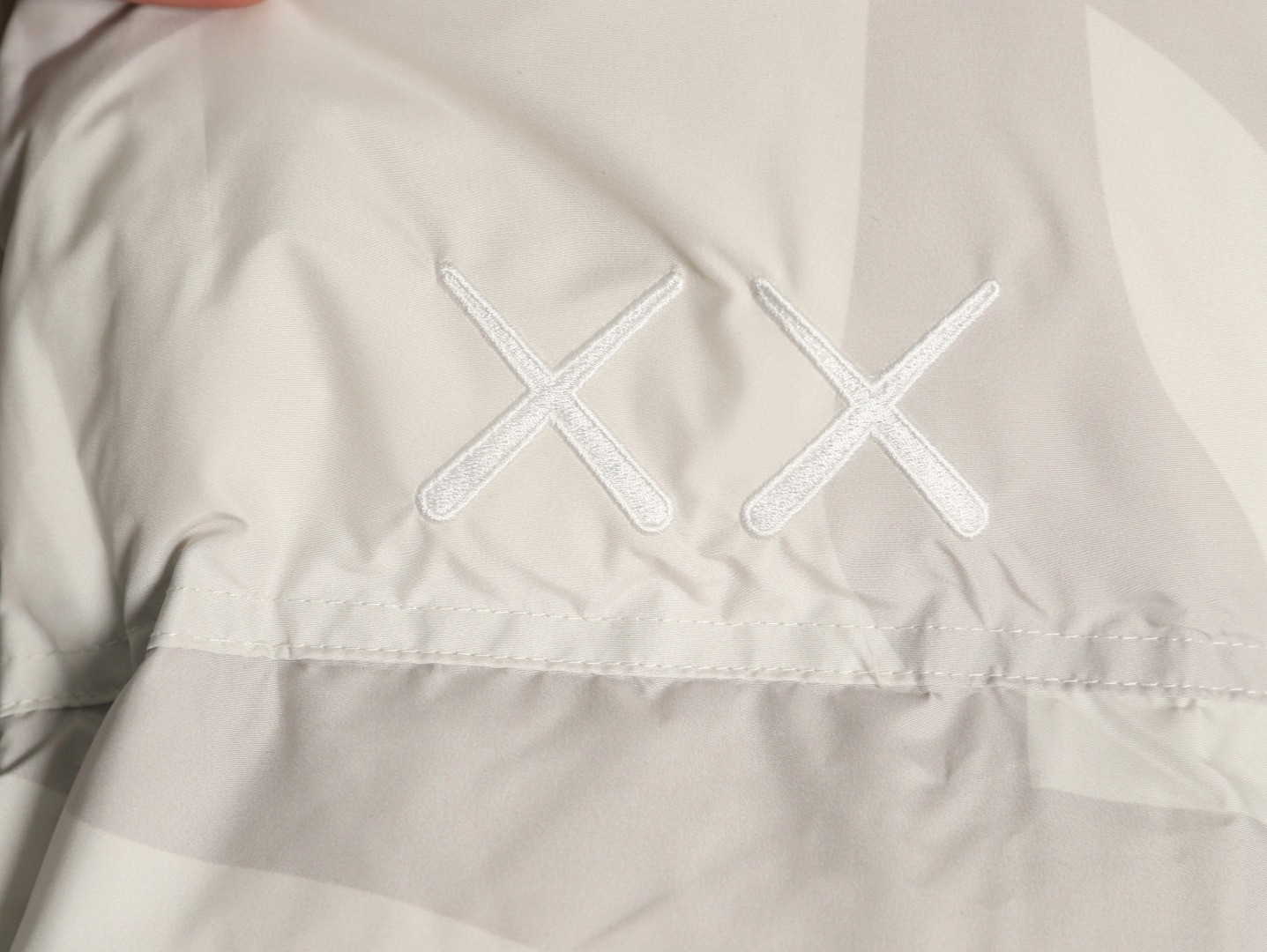 the n0r*h Fa*e x kaws short puffer jacket