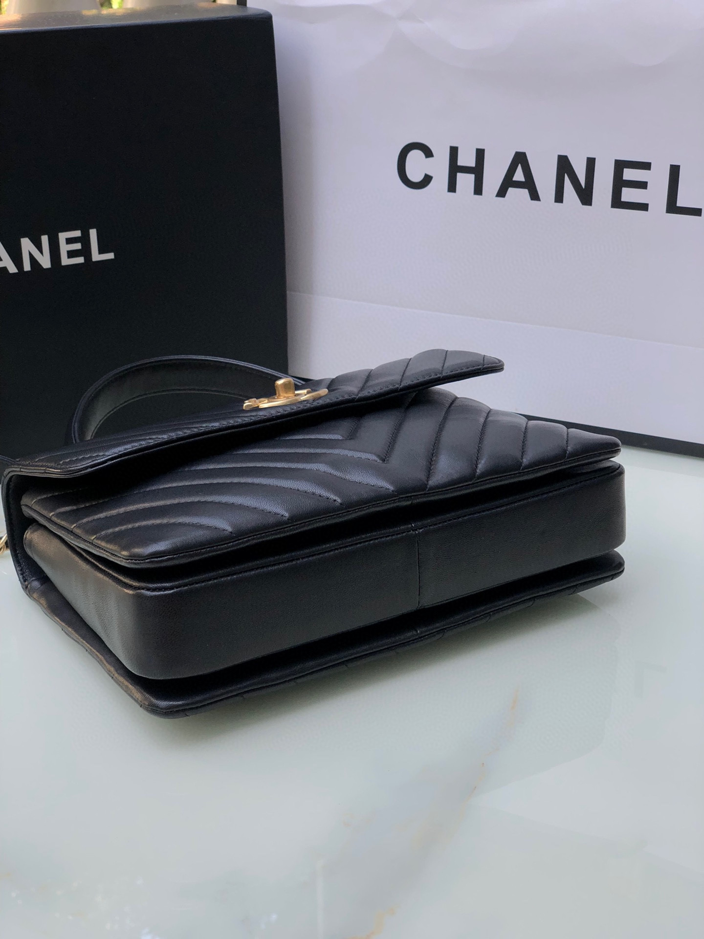 Ch**el FLAP BAG WITH TOP HANDLE 6.6 × 9.8 × 4.7 in