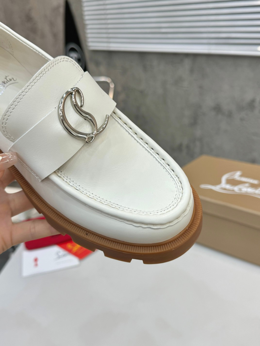 UA Chr1st1an Louboutin(CL) logo design,the latest runway version of the red-soled shoes