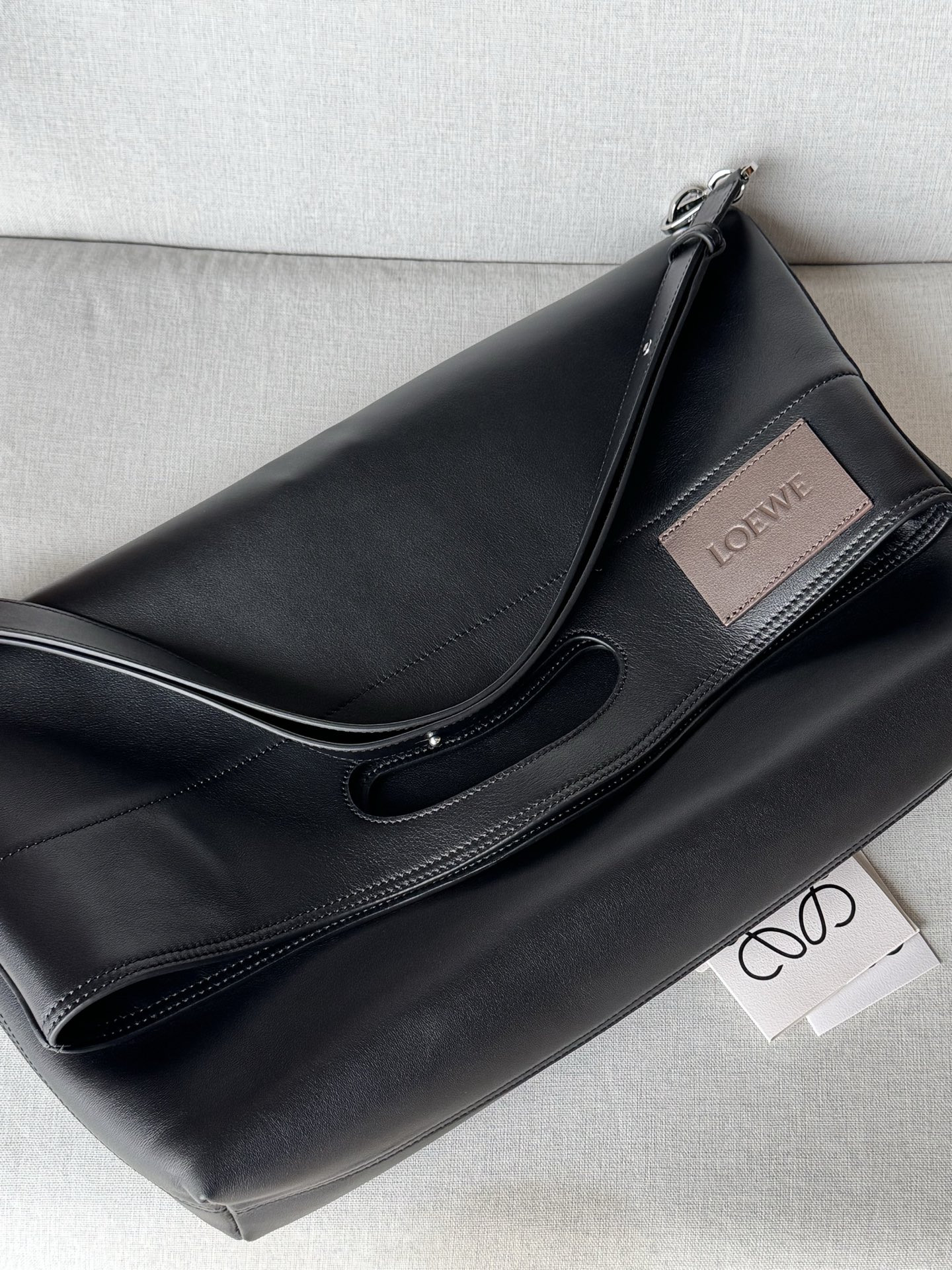 l0ew* bob folded tote in shiny S*pple calfskin