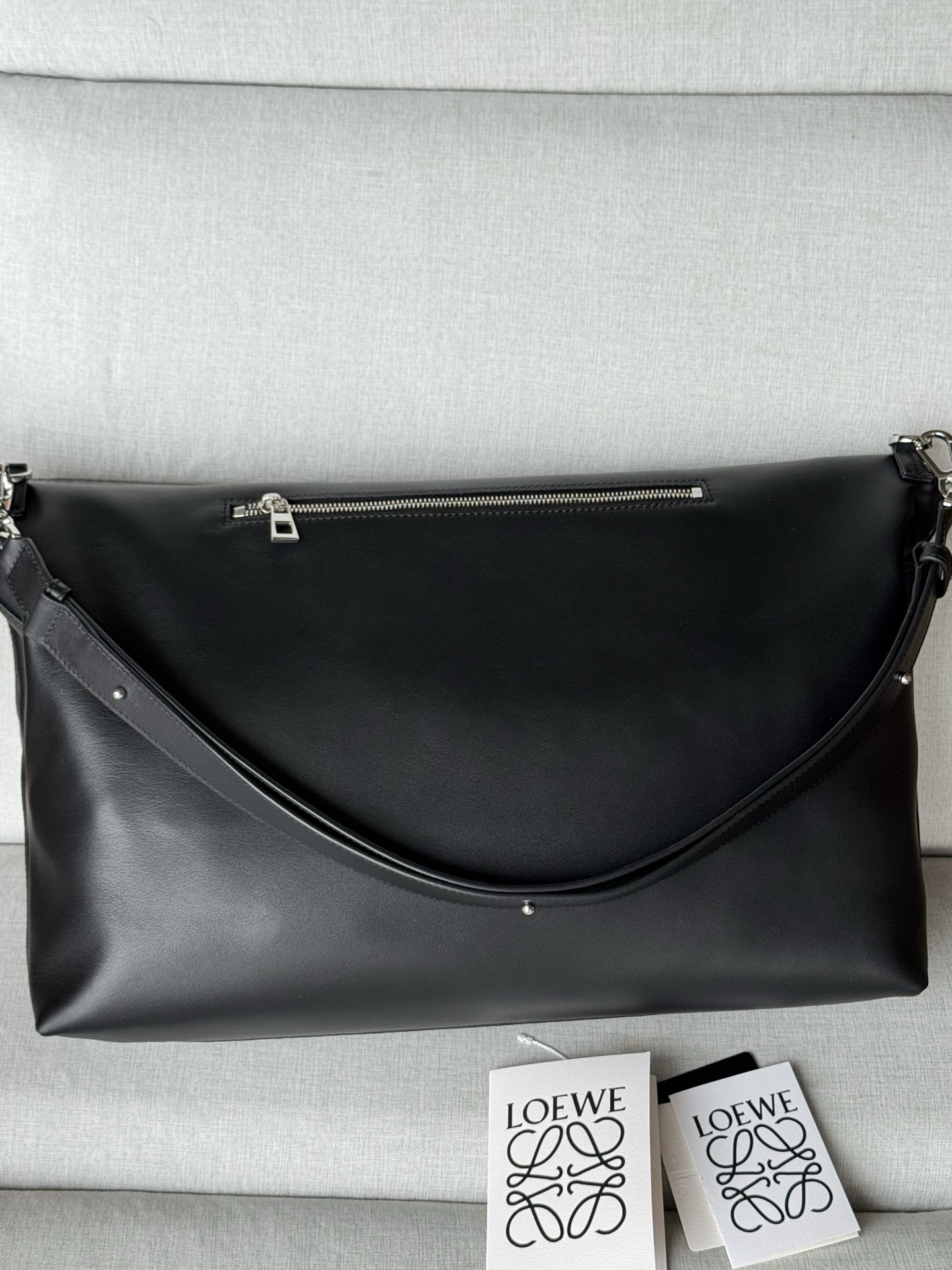 l0ew* bob folded tote in shiny S*pple calfskin