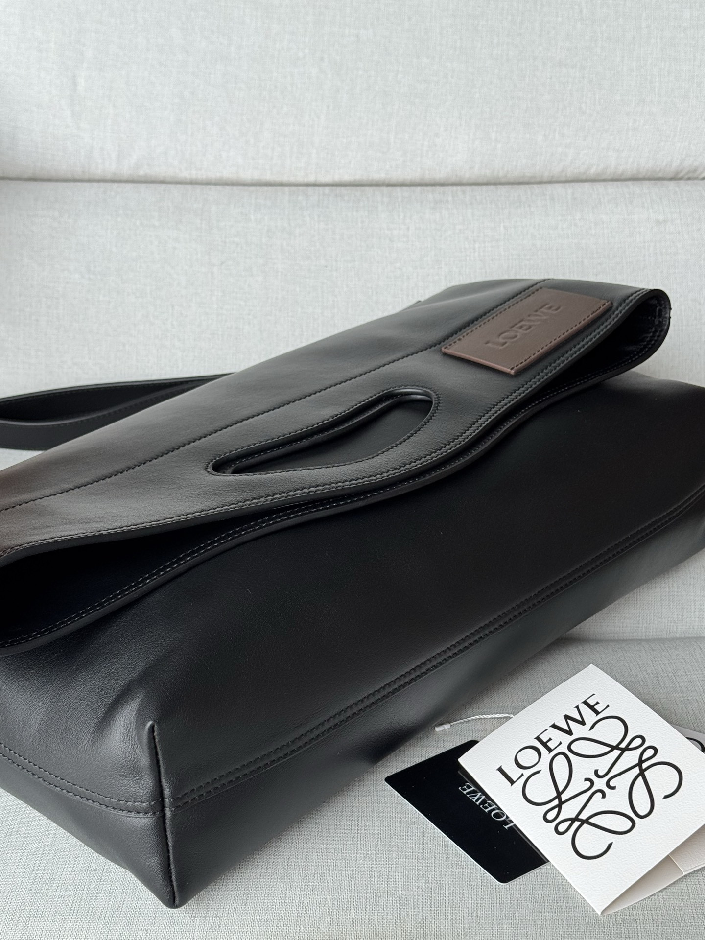 l0ew* bob folded tote in shiny S*pple calfskin